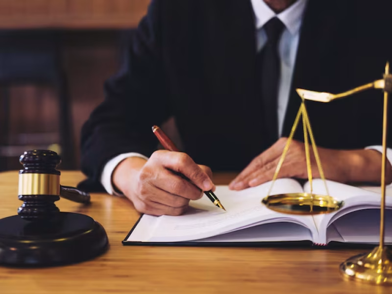 businessman-suit-lawyer-working-documents_28283-61